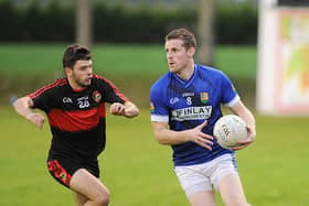 Ronan Carroll of St Mary’s taking on Dreadnots’ Barry Faulkner in the Louth Senior Championship sem-final in Haggardstown