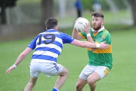 Jonathan Connolly of Sean O’Mahony’s gets the better of Dundalk Gaels’ Niall Hearty in the Louth Senior Championship sem-final in Haggardstown