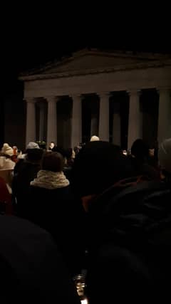 National Pen employee Fabio Tereinto reads a poem for his former co-worker Yosuke Sasaki