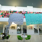 ​The unveiling of the finished tufted artworks at Creative Spark created throughout the Community Ties project