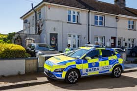 Garda at the scene of a property on Hand Street in Drogheda, County Louth, yesterday, where they are carrying out a search as part of the investigation into his disappearance Irish schoolboy Kyran Durnin