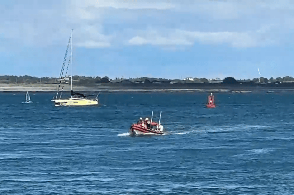   Members of RNLI and Coast Guard during a rescue operation after a fishing boat sank in Carlingford Lough.  