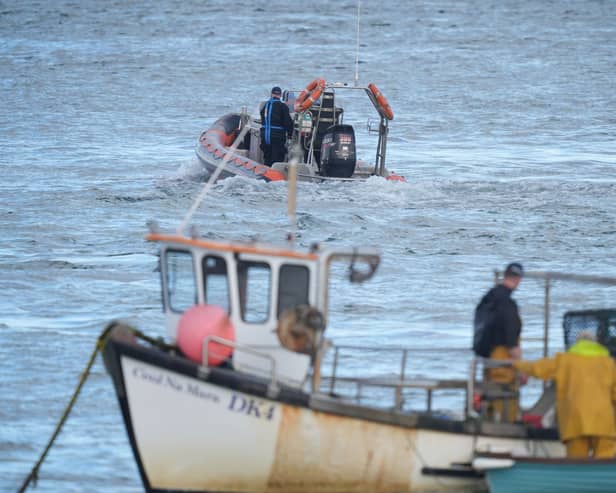 Members of Dundalk Sub Aqua search and rescue head out to join a rescue operation after a fishing boat sank in Carlingford Lough. 