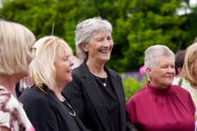 President Catherine Connolly with guests while hosting her first presidential Garden Party at Aras an Uachtarain
