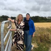 Senator Comyn and Newtown View residence association chair Mihaela Balan at the location of the proposed lane