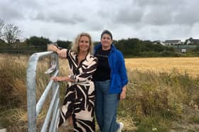 Senator Comyn and Newtown View residence association chair Mihaela Balan at the location of the proposed lane