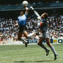 Diego Maradona beats Peter Shilton to the punch, scoring the most controversial goal in World Cup history. Maradona's Argentina went on the beat England, before winning the 1986 renewal in Mexico