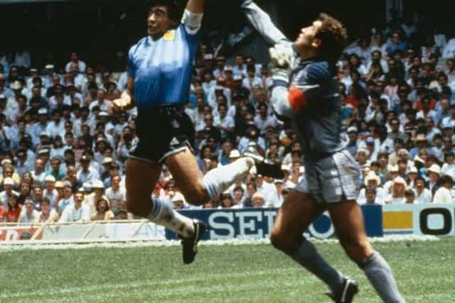 Diego Maradona beats Peter Shilton to the punch, scoring the most controversial goal in World Cup history. Maradona's Argentina went on the beat England, before winning the 1986 renewal in Mexico