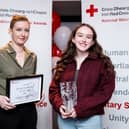 Lorna Costello and Isabella Nordon from the Dundalk Red Cross who was awarded Young Volunteer of the Year 2025
