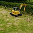 Ditch clearing by a gas marker