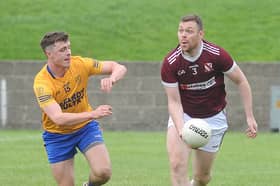 Ben Boyce of Oliver Plunkets taking on Conor Quigley of Kilkerley Emmets