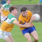 Ben Goss-Kieran of St. Mochta's against Oisin Reidy of St. Joseph's