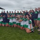 St. Patrick's players celebrate with the senior trophy