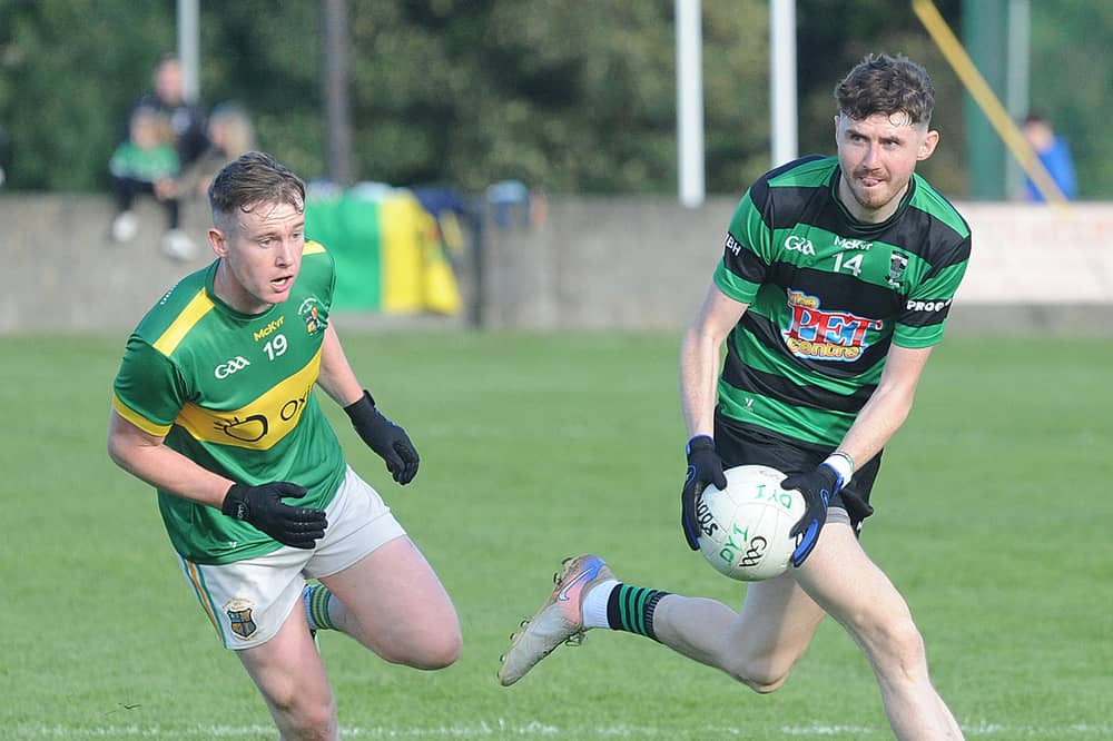 Ruairi Kelly of Dundalk Young Irelands against Adam Hanratty of Naomh Fionnbarra