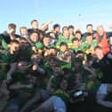 Naomh Fionnbarra celebrate with the Christy Bellew Cup