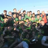 Naomh Fionnbarra celebrate with the Christy Bellew Cup