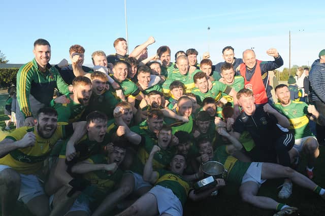 Naomh Fionnbarra celebrate with the Christy Bellew Cup