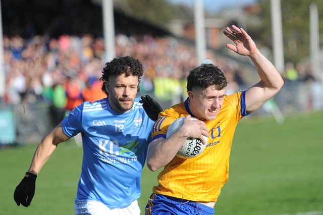 Ben Goss-Kieran of St Mochtas and Conor Branigan of Newtown Blues
