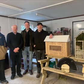 Ben McCabe, pictured with members of the Carrickmacross Men's Shed Pearse Callan, Frank Ward, and Hugh Crawley