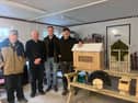 Ben McCabe, pictured with members of the Carrickmacross Men's Shed Pearse Callan, Frank Ward, and Hugh Crawley