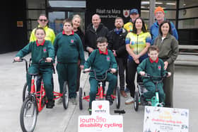 Mark Fitzimons and James O'Hanlon with Réalt na Mara pupils and teachers and members of the Louth Disability Cycle Club