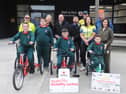 Mark Fitzimons and James O'Hanlon with Réalt na Mara pupils and teachers and members of the Louth Disability Cycle Club