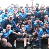 Newtown Blues celebrate with the 2026 Joe Ward Cup after defeating St. Mochtas at Integral GAA Grounds, Drogheda