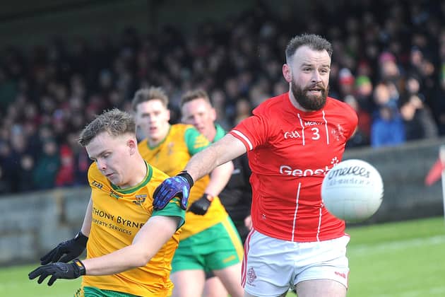 Cillian Kirk of St Bride's can only watch as Dylan Shevlin sends over a Stabannon score 