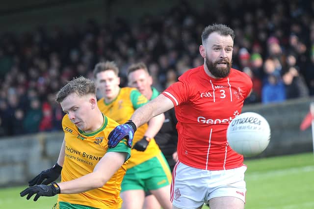 Cillian Kirk of St Bride's can only watch as Dylan Shevlin sends over a Stabannon score