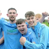 Newtown Blues captain Ciarán Downey celebrate with team mates at full time