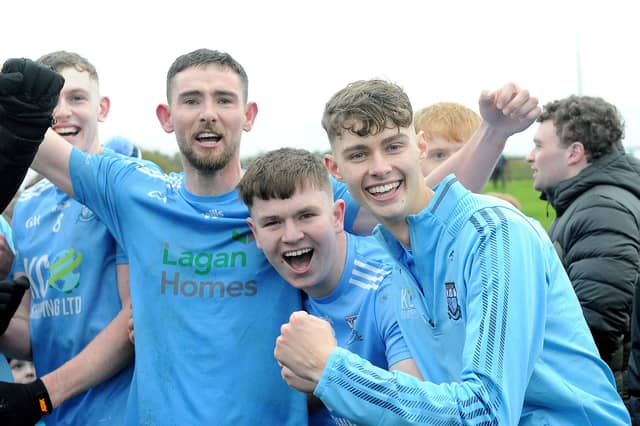Newtown Blues captain Ciarán Downey celebrate with team mates at full time