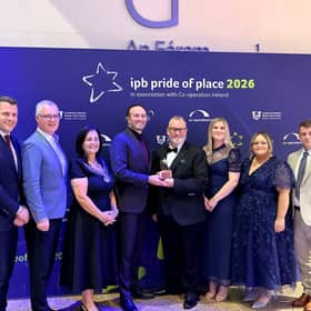 Kevin Moran and Stacy McVeigh of Dundalk Youth Centre receive the runners-up award in the Community Youth Initiative category at the IPB Pride of Place Awards 2026, alongside Cllr Dolores Minogue, Cathaoirleach of Louth County Council, council representatives and Co-operation Ireland officials.