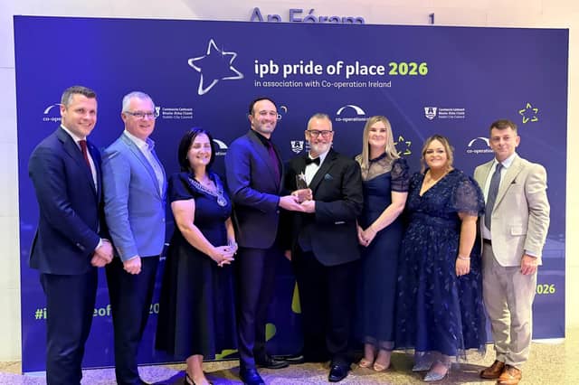 Kevin Moran and Stacy McVeigh of Dundalk Youth Centre receive the runners-up award in the Community Youth Initiative category at the IPB Pride of Place Awards 2026, alongside Cllr Dolores Minogue, Cathaoirleach of Louth County Council, council representatives and Co-operation Ireland officials.