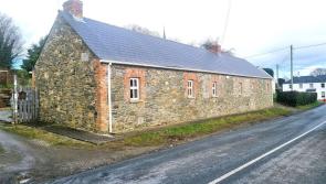 PICTURES: Beautiful Louth stone house with sun trap gardens hits the market for €260,000 
