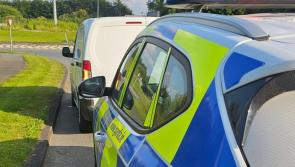 Louth driver so distracted by phone they miss marked Garda car 