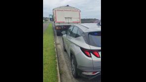 Dundalk gardai catch HGV driver holding phone while driving in Bellurgan 