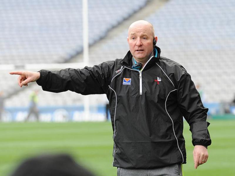 How many father-and-sons have won Louth senior championship medals?