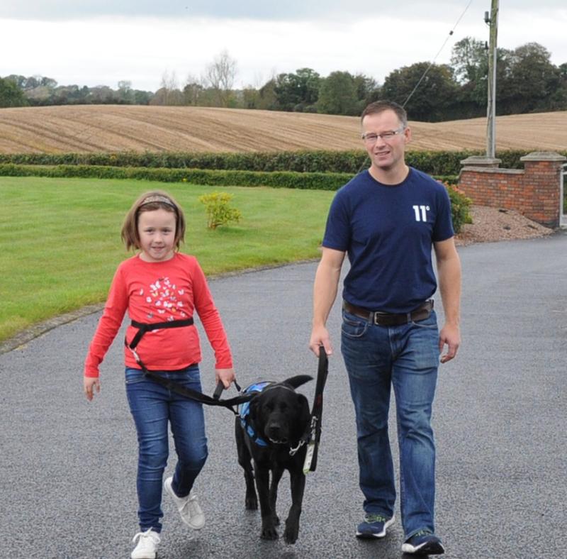 Assistance dog Dixie convinces Knockbridge man to run Dublin Marathon