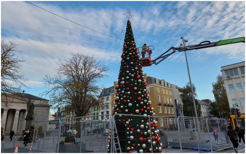 The Christmas tree being built at the Square this afternoon
