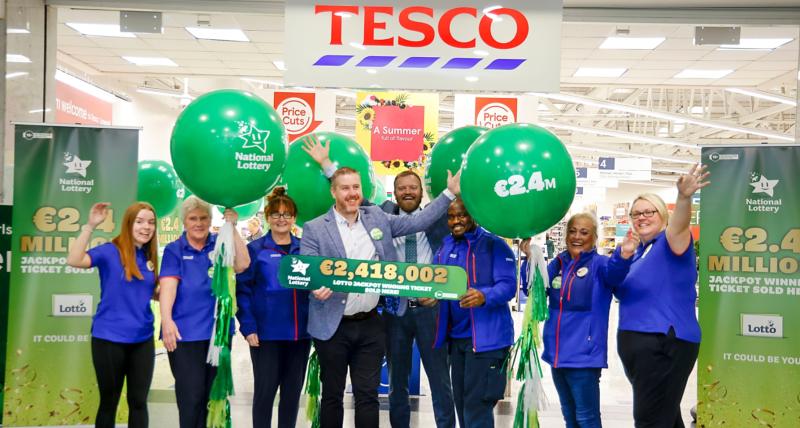 Staff in Tesco Dundalk celebrate after selling €2.4m winning Lotto ticket