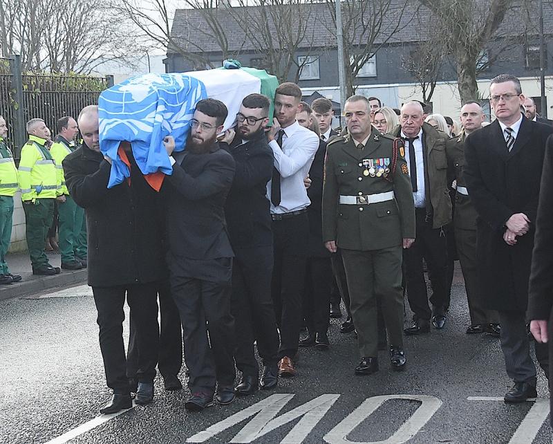 Pte Se&aacute;n Rooney remembers as a "kind and loving" hero 