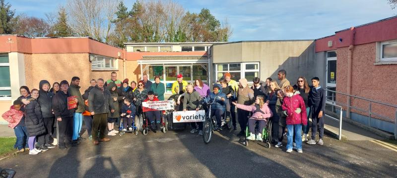 Louth Disability Cycling Club donate bike to St Mary's Drumcar