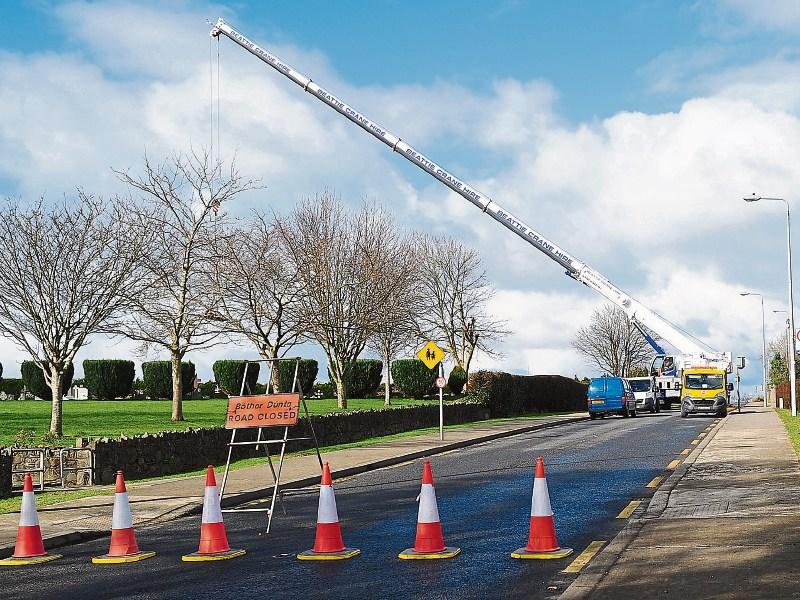 Haughey monument lifted into cemetery