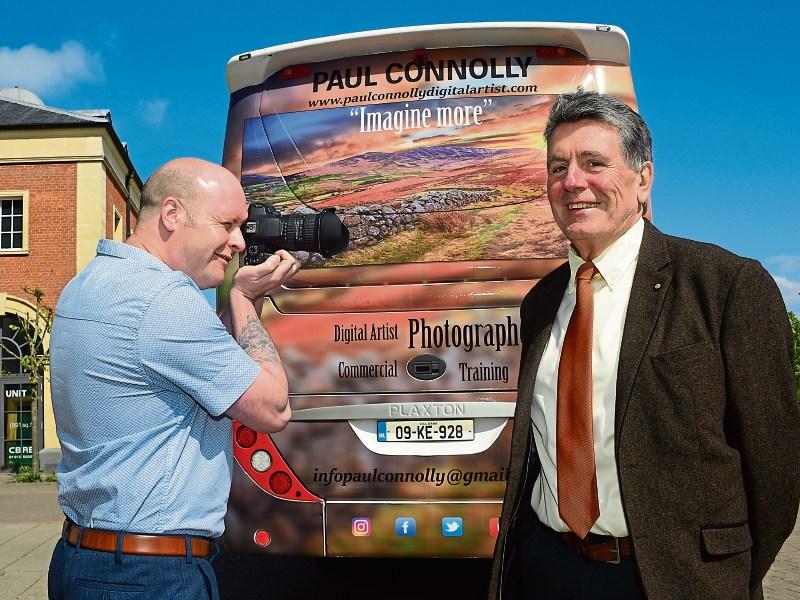 Local digital artist is standing tall on buses