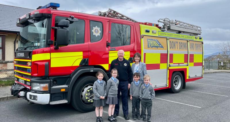Pupils of Scoil Mhuire gan Smál visited by the Dundalk Fire Brigade personnel