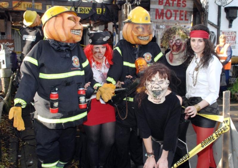 Spot the real ones  Staff at Fitzpatrick,s with some of the Halloween Display  at their premises on the  Carlingford road