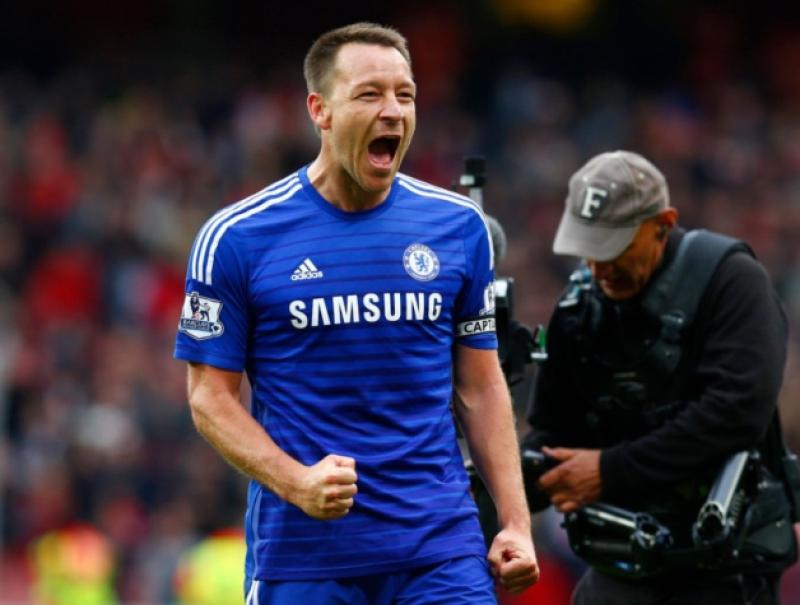 John Terry celebrates Chelseas 0-0 draw with Arsenal on Sunday