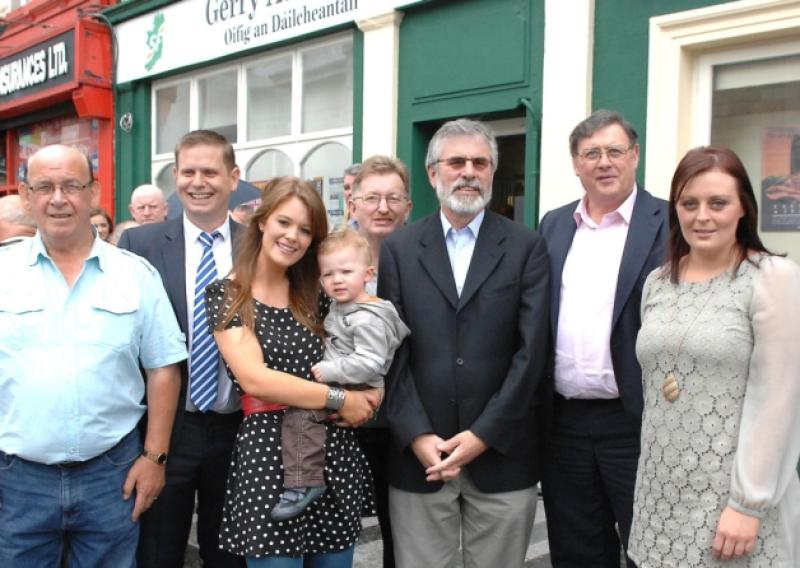 Gerry Adams  TD and President of Sinn Fein  at the offical opening of  the Sinn Fein  Office  on CRowe street with Local Cllr,s Harry Todd Tomas Sharkey Jenifer Green and son  Michael Pearse McGeough Jim Loughran and Edel Corrigan