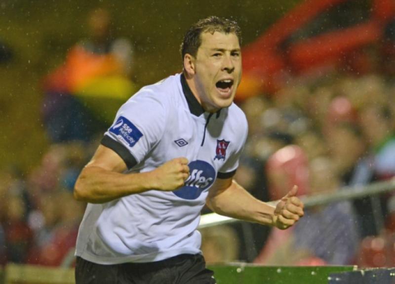 Brian Gartland celebrates his late winner in Turners Cross on Friday night