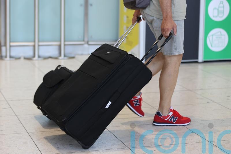 Passengers queue outside airport from early morning as Easter rush begins
